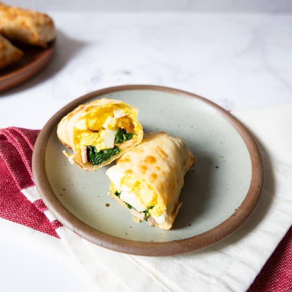 Photo of Breakfast Egg Rolls with Egg, Spinach, and Canadian Bacon by WW