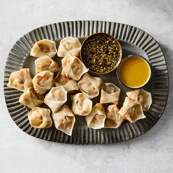 Photo of Steamed vegetable dumplings with two dipping sauces by WW