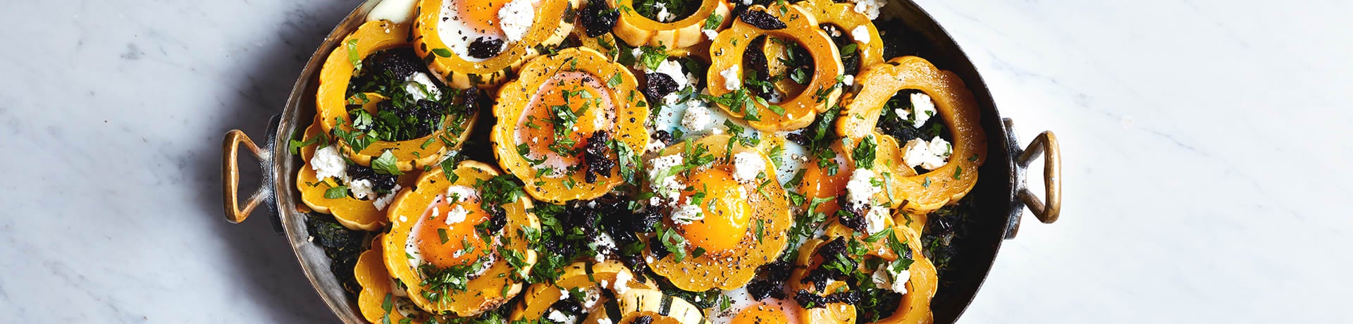 Photo of Baked eggs with delicata squash, spinach and feta by WW