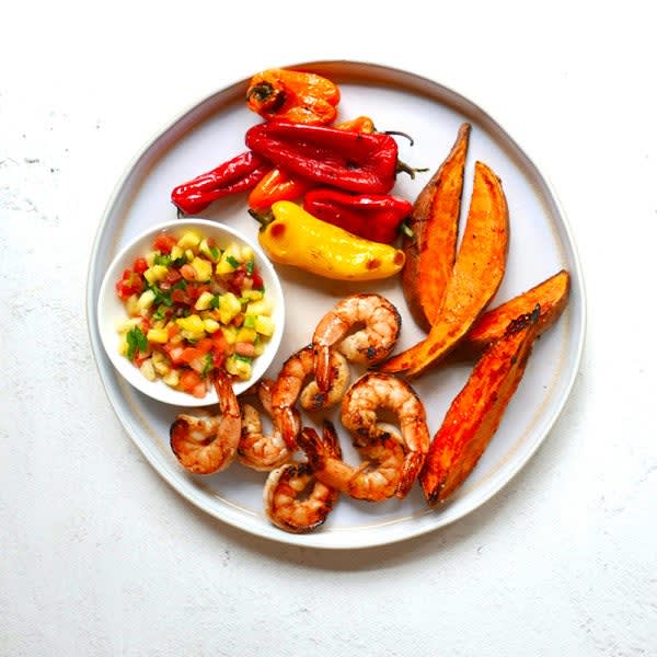 Photo of Seared shrimp with roasted sweet potatoes & peppers by WW