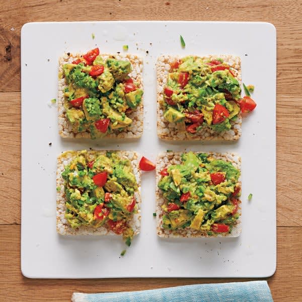 Photo of Chunky Guacamole–Topped Rice Cakes by WW