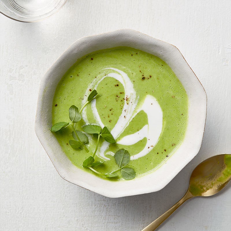 Photo of Silky spring pea soup with lemon-herb drizzle by WW