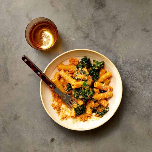 Photo of Spicy Pumpkin Rigatoni with Sausage & Kale by WW