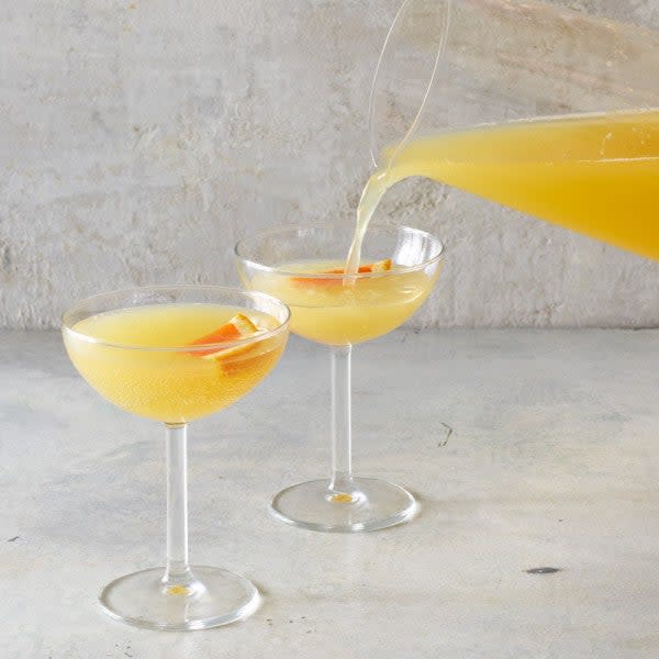 Photo of Blushing orange champagne cocktail by WW