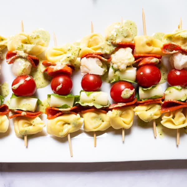 Photo of Antipasto Pasta Skewers with Creamy Pesto Drizzle by WW