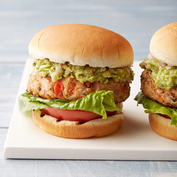 Photo of Mexican turkey burgers with mashed avocado spread by WW