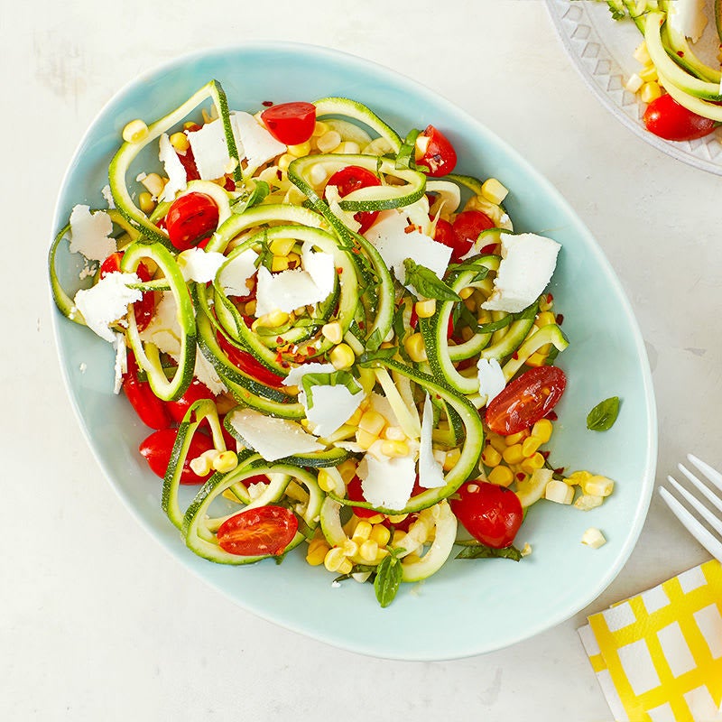 Photo of Zucchini noodle salad with tomatoes corn and basil by WW